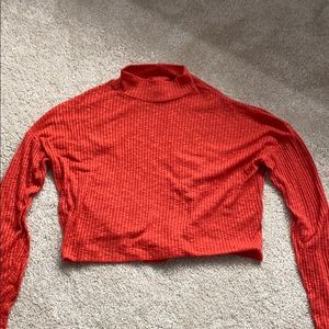 red cropped light mock neck
